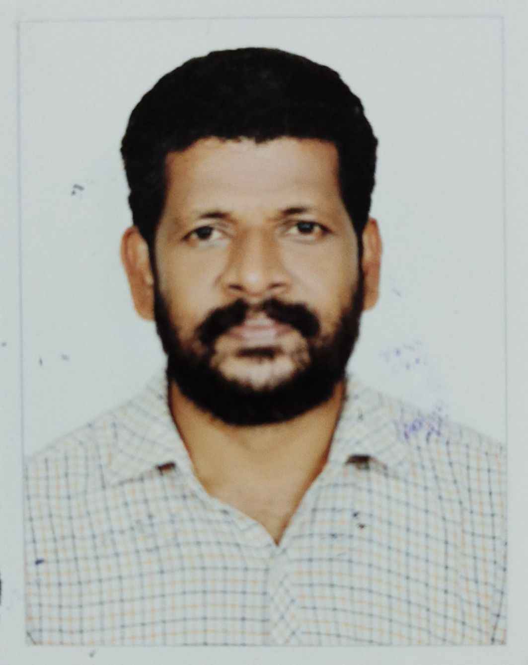 Vasu T K