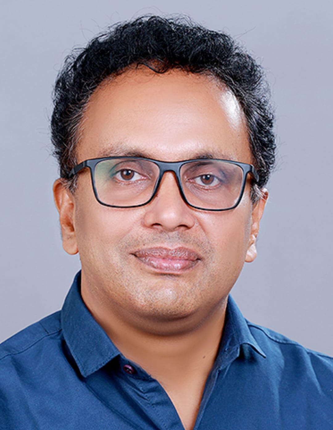 Adv. Basil John